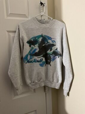Lee Gray Crewneck Sweatshirt with Blue Dolphin Graphic